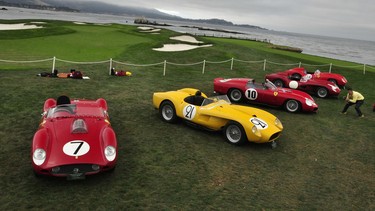 Ferrari Testa Rossas line the far end of the fairway at Pebble Beach golf course. Italian for Redhead these cars are one of the truly greatest car designs and maybe the inspiration for the Ferrari Enzo.