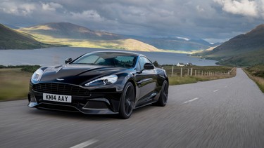 The 2015 Aston Martin Vanquish Coupe navigates the twisty sea-side roads in Inverness, Scotland.