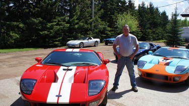 Lawayne Musselwhite stands next to the red and white 2006 Ford GT that recently sold at auction for $265,000.