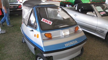 The three-wheeled Honda Zoe Zipper got great gas mileage but had no room for passengers.
