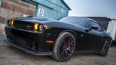 The 2015 Dodge Challenger SRT Hellcat pays homage to its history, but is a throughly modern sports car.