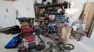 You can rearrange all the clutter in that small garage however you want, but it'll still be a tight squeeze.
