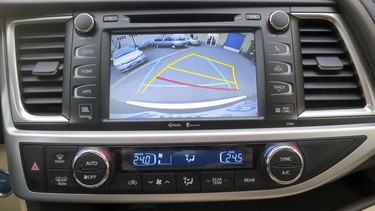 All Highlander models come with rear view backup cameras, but the Limited also gets clearance and backup sensors.