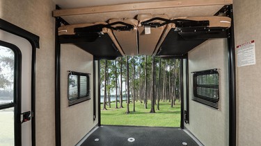 An RV with a garage — dubbed a 'toy hauler' — allows camping enthusiasts to carry all kinds of toys, from ATVs to dirt and street bikes to bicycles, canoes and kayaks.