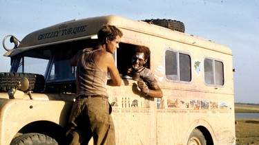 Robert Bateman and Bristol Foster in India with their 1957 Land Rover during their 60,000 kilometer round-the-world trip.