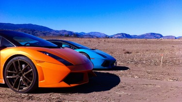 Two Lamborghinis owned by Area 27 members at rest on the planned site of the 4.9-kilometre race circuit designed by Jacques Villeneuve in B.C.'s South Okanagan.