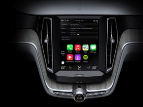 Apple's CarPlay infotainment system will be available in 40 new car models starting this year.