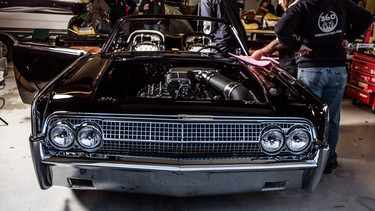 The crew at 360 Fabrication in Abbotsford, putting the finishing touches  on a 1963 Lincoln on Friday March 13, 2015,