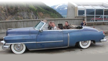 Jim Carpenter takes his sons for a cruise in Revelstoke shortly after getting the Royal Tour 1951 Cadillac convertible back on the road for the first time in 45 years.