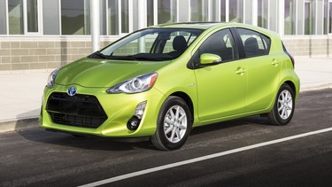 The 2015 Toyota Prius c features a restyled front and rear with a lower body that provides a more athletic look.