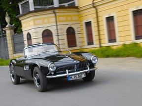 Brian Harper behind the wheel of a classic BMW 507 just like Elvis used to own.