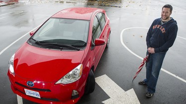 David Ford with the Toyota Prius c he drove for a week during our Commuter Challenge.