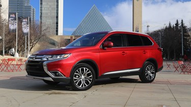 The 2016 Mitsubishi Outlander, parked with Edmonton city hall in the background, was unveiled at the Edmonton Motorshow.