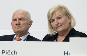In this May 22, 2014 file photo Chairman of the board of Volkswagen AG Ferdinand Piech and his wife Ursula Piech, member of the board, attend a meeting of Audi in Ingolstadt, Germany. Piech and his wife will step back from their posts as Volkswagen announced on Saturday, April 25, 2015.