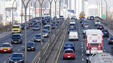 Traffic flows east and west-bound on the Gardiner Expressway, in and out of downtown Toronto during the evening commute. A new University of Toronto study finds just 25 per cent of cars contribute to 90 per cent of air pollution on Canadian roads.