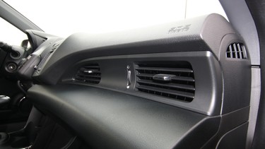About the only acknowledgement of the passenger in terms of the driver-oriented cockpit are these air vents.