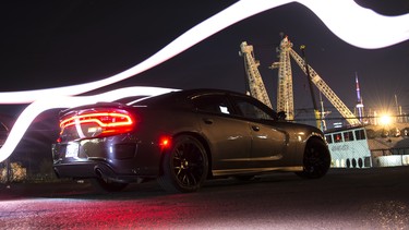 The 2015 Dodge Charger SRT Hellcat lurks in the night, plotting and scheming how it can best raise hell at any given moment.