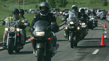 Motorcycles head down Bow Bottom Trail during a past ride.