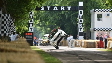 Stuntman Terry Grant set a new record for driving on two wheels at the Goodwood Festival of Speed.