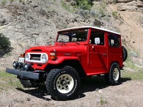 The 1978 FJ 40 Land Cruiser features a bold front end with a white painted grille, over-sized headlamps, and a heavy-duty bumper. The original owner of this unit also installed a winch and a pair of driving lamps to ensure that it was ready for adventure,