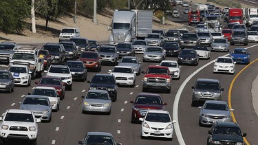 In this June 24, 2015, file photo, afternoon rush our traffic moves along a highway in Phoenix. The average vehicle in the U.S. is now a record 11.5 years old, according to consulting firm IHS Automotive, a sign of the increased reliability of today’s vehicles and the lingering impact of the sharp drop in new car sales during the recession.