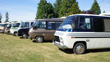 A row of exotic 1970s GMC motorhomes owned by members of the GMC Cascaders club.