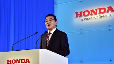 Honda CEO Takahiro Hachigo speaks before the press at the company's headquarters in Tokyo on July 6, 2015. Hachigo spoke about his global vision just weeks after taking office as the auto giant grapples with the effects of a widening recall scandal over potentially fatal airbags.
