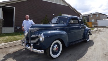 Arthur Lange and his pristine 1940 Plymouth Club Coupe.