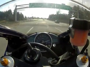 A video screengrab from Youtube of a motorcycle speeding along a BC highway at speeds up to 299 km/h on Vancouver Island. The video was posted by user "Joe Blow" on April 8, 2012.