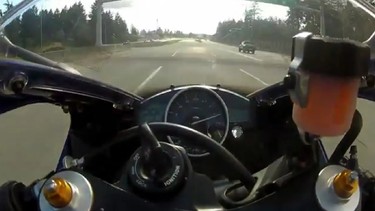 A video screengrab from Youtube of a motorcycle speeding along a BC highway at speeds up to 299 km/h on Vancouver Island. The video was posted by user "Joe Blow" on April 8, 2012.