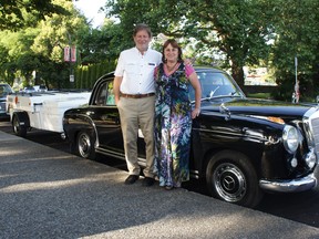 Fred and Elisabeth Smits with their 1957 Mercedes Benz 200S, which they're taking around the world.