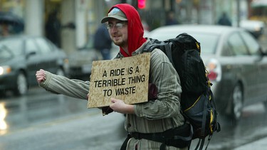 Phillip Moore hitches for a ride in Toronto in this file photo.