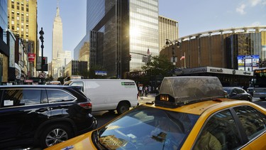 Traffic travels up Eighth Avenue in New York on Tuesday, Aug. 25, 2015. Traffic congestion nationally reached a new peak last year and is greater than ever before, according to a report by the Texas A&M Transportation Institute and INRIX Inc.