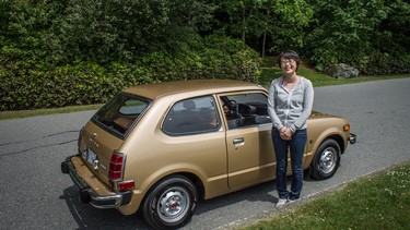 Hiroko Marunaka proudly displays her 1977 Honda Civic that had driven just 87,000 kilometres. The car is part of the Japanese Collectibles display at the Luxury & Supercar Weekend.