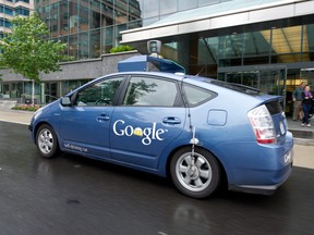 The Google self-driving car maneuvers through the streets of in Washington, D.C. May 14, 2012. The system on a modified Toyota Prius combines information gathered from Google Street View with artificial intelligence software that combines input from video cameras inside the car, a LIDAR sensor on top of the vehicle, radar sensors on the front of the vehicle and a position sensor attached to one of the rear wheels that helps locate the car's position on the map.