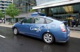 The Google self-driving car maneuvers through the streets of in Washington, D.C. May 14, 2012. The system on a modified Toyota Prius combines information gathered from Google Street View with artificial intelligence software that combines input from video cameras inside the car, a LIDAR sensor on top of the vehicle, radar sensors on the front of the vehicle and a position sensor attached to one of the rear wheels that helps locate the car's position on the map.