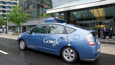 The Google self-driving car maneuvers through the streets of in Washington, D.C. May 14, 2012. The system on a modified Toyota Prius combines information gathered from Google Street View with artificial intelligence software that combines input from video cameras inside the car, a LIDAR sensor on top of the vehicle, radar sensors on the front of the vehicle and a position sensor attached to one of the rear wheels that helps locate the car's position on the map.