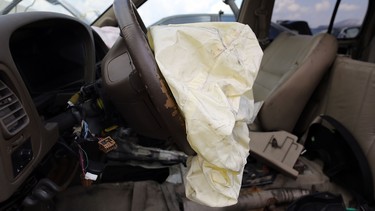 A deployed airbag is seen in a Nissan vehicle at the LKQ Pick Your Part salvage yard on May 22, 2015 in Medley, Florida. The U.S. NHTSA has issued an advisory against buying defective Takata airbags online, from scrapyards or any other unauthorized source, for that matter.