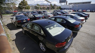 In this Sept. 23, 2015 file photo, Volkswagen diesel cars are parked in a storage lot near a VW dealership in Salt Lake City.