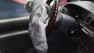 A deployed airbag is seen in a Chrysler vehicle at the LKQ Pick Your Part salvage yard on May 22, 2015 in Medley, Florida. Takata's defective airbag inflators could be found in additional automakers, including Jaguar, Land Rover, Mercedes-Benz, Tesla and Volkswagen.