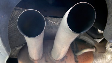 The exhaust of a Volkswagen Passat Bluemotion is photographed in Frankfurt, Germany, Thursday, Sept. 24, 2015.