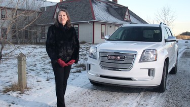 Maureen Scheurkogel alongside the refreshed 2016 GMC Terrain Denali.