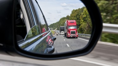 Interstate Traffic In The Rear View Mirror