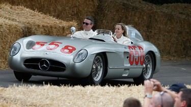 Williams reserve driver Susie Wolff driving a Mercedes Benz 300SLR  at Goodwood on June 26, 2015 in Chichester, England.
