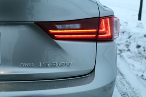 The taillight of the sedan.