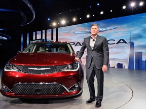 FCA head of passenger car brands Tim Kuniskis presents the Chrysler 2017 Pacifica minivan during the press preview of the 2016 North American International Auto Show in Detroit, Michigan, on January 11, 2016.