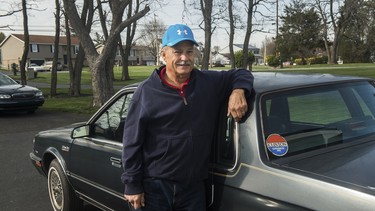 In an April 6, 2016 photo, Gettysburg, Pa. resident Mike Lawn stands next to a car formerly owned by Hillary Clinton in Gettysburg, Pa. The retired White House gardener is selling Clinton’s 1986 Oldsmobile Cutlass, which he bought at an auction for the residence’s workers and has been sitting in his Pennsylvania garage for years.