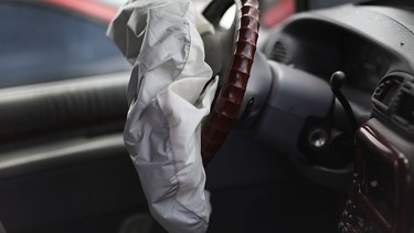 A deployed airbag is seen in a Chrysler vehicle at the LKQ Pick Your Part salvage yard on May 22, 2015 in Medley, Florida. The largest automotive recall in history centers around the defective Takata Corp. air bags that are found in millions of vehicles that are manufactured by BMW, Chrysler, Daimler Trucks, Ford, General Motors, Honda, Mazda, Mitsubishi, Nissan, Subaru and Toyota.  (Photo by Joe Raedle/Getty Images) ORG XMIT: POS1505221337593884 ORG XMIT: POS1511061439085690
