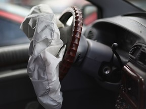 A deployed airbag is seen in a Chrysler vehicle at the LKQ Pick Your Part salvage yard on May 22, 2015 in Medley, Florida.