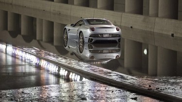 A Ferrari California was abandoned in an underpass that flooded during storms in Toronto on July 8, 2013